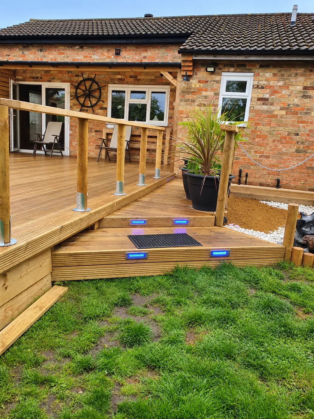 Timber deck with steps and blue LED step lights built by Josh Spoore